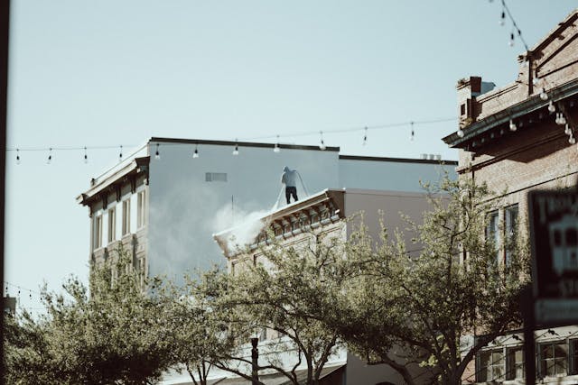 a-building-with-a-sign-on-it-and-a-street